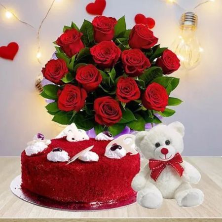 10 Red Roses Bouquet with Half Kg Red Velvet Cake n Teddy