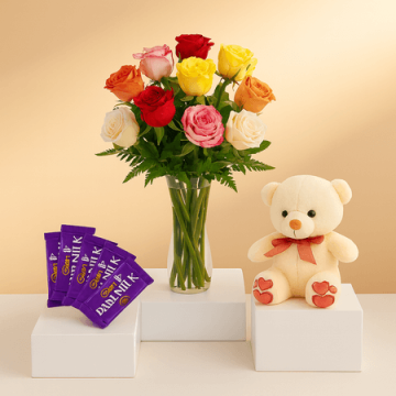 6 MIX FLOWERS BUNCH,1 TEDDY BEAR AND 5 ASSORTED CADBURY CHOCOLATES