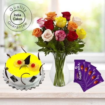 Eggless Pineapple Cake 1.5 Kg with 6 Mix Roses Bunch and 5 Chocolates