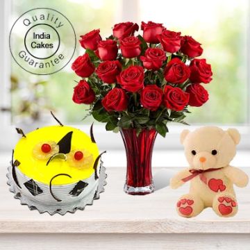 Eggless Pineapple Cake 1 Kg with 6 Red Roses Bunch and a Teddy Bear
