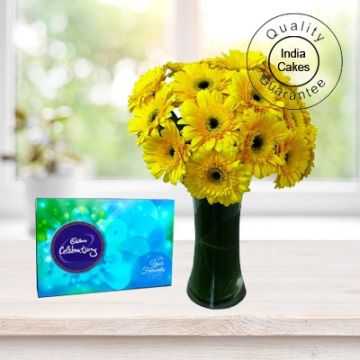 12 YELLOW ROSES WITH CADBURY CELEBRATION PACK