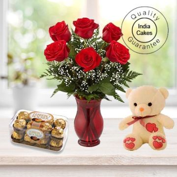 6 RED ROSES BUNCH , 16 PCS FERRERO ROCHER CHOCOLATES AND 1 TEDDY BEAR