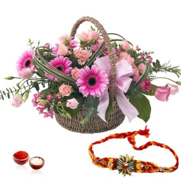 20 Pink Roses Gerberas Basket Arrangement With Rakhi
