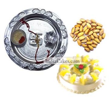 Silver Thali And Half Kg Eggless Pineapple Cake And 250 gms Pista Dryfruits