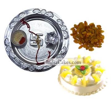 Silver Thali And Half Kg Eggless Pineapple Cake And 250 gms Raisins Dryfruits