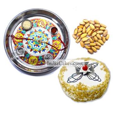 Silver Thali With Design And Half Kg Eggless Butterscotch Cake And 250 gms Pista Dryfruits