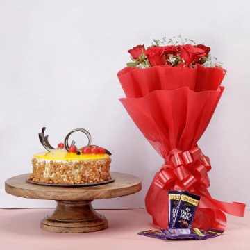 Red Cherry Butterscotch Cake with 8 Red Roses and 5 Dairy Milk Chocolates
