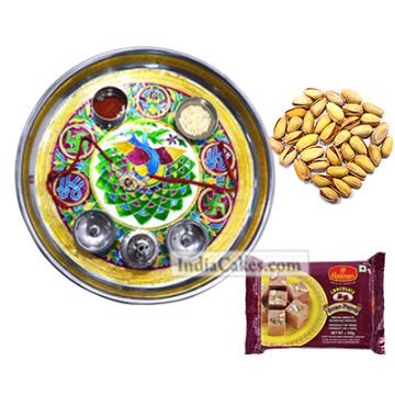 Golden Thali With Green Design And Soanpapdi And Pista