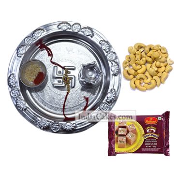Silver Thali With Design And Soanpapdi And Cashew