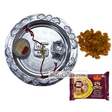 Silver Thali With Design And Soanpapdi And Raisins