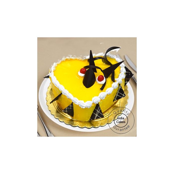 1 Kg Eggless Mango Cake Heart Shape