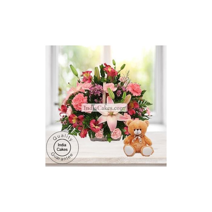 4 Lilies and 15 Carnations Arranged in Basket With a Cute Teddy 4 Lilies and 15 Carnations Arranged in Basket With a Cute Teddy