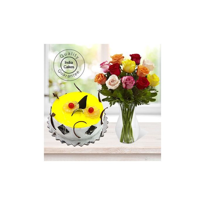 Pineapple Cake Half Kg with 6 Mix Roses Bunch Pineapple Cake Half Kg with 6 Mix Roses Bunch