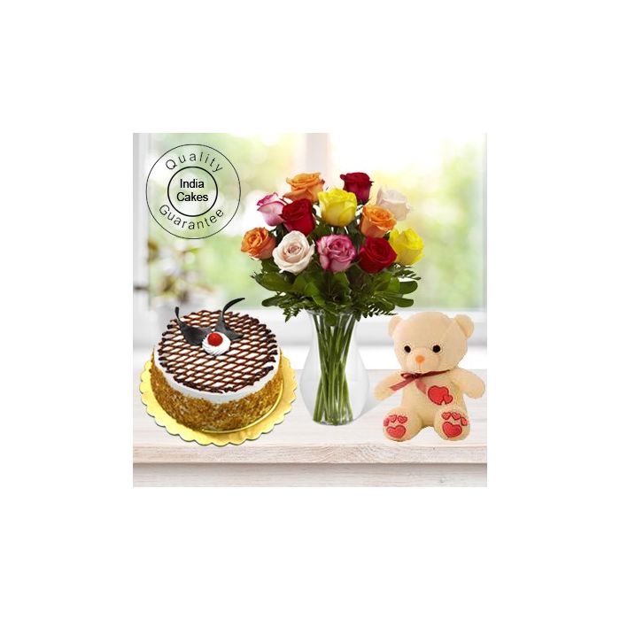 Eggless Butterscotch Cake 1 Kg with 6 Mix Roses Bunch and a Teddy Bear Eggless Butterscotch Cake 1 Kg with 6 Mix Roses Bunch and a Teddy Bear