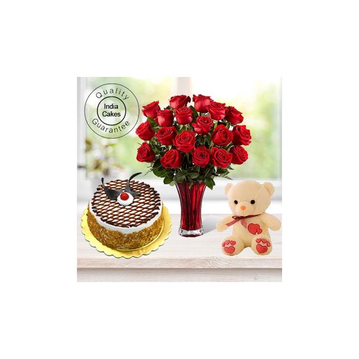 Eggless Butterscotch Cake Half Kg with 6 Red Roses Bunch and a Teddy Bear Eggless Butterscotch Cake Half Kg with 6 Red Roses Bunch and a Teddy Bear
