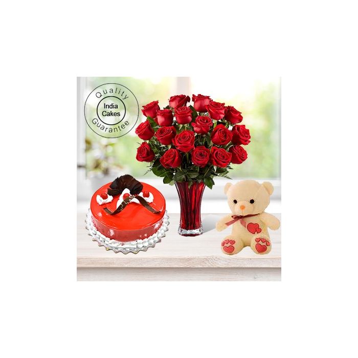 Eggless Strawberry Cake 1 Kg with 6 Red Roses Bunch and a Teddy Bear Eggless Strawberry Cake 1 Kg with 6 Red Roses Bunch and a Teddy Bear