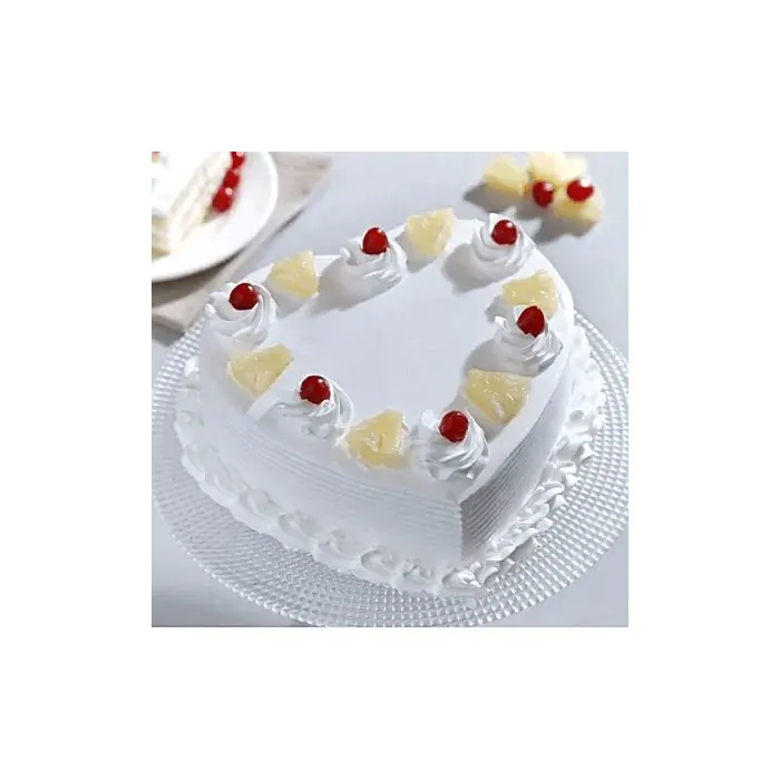 Eggless Heart Shaped Anniversary Pineapple Cake Half Kg Eggless Heart Shaped Anniversary Pineapple Cake Half Kg