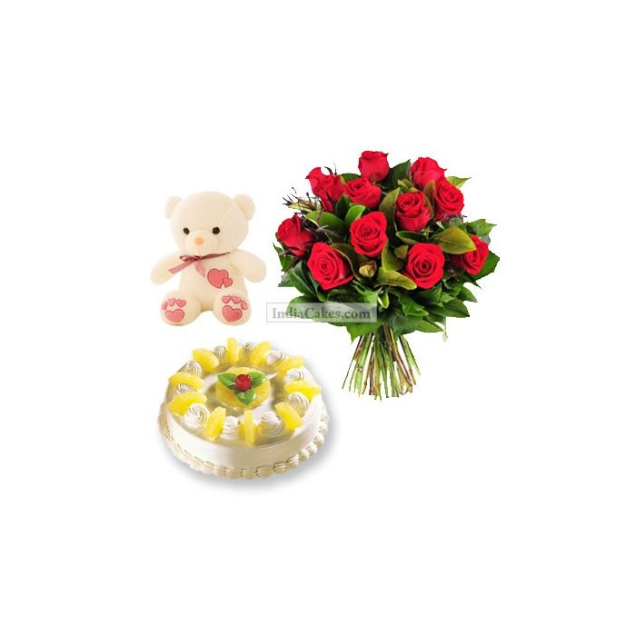 Eggless Pineapple Cake 1 Kg with 6 Red Roses Bunch and a Teddy Bear Eggless Pineapple Cake 1 Kg with 6 Red Roses Bunch and a Teddy Bear