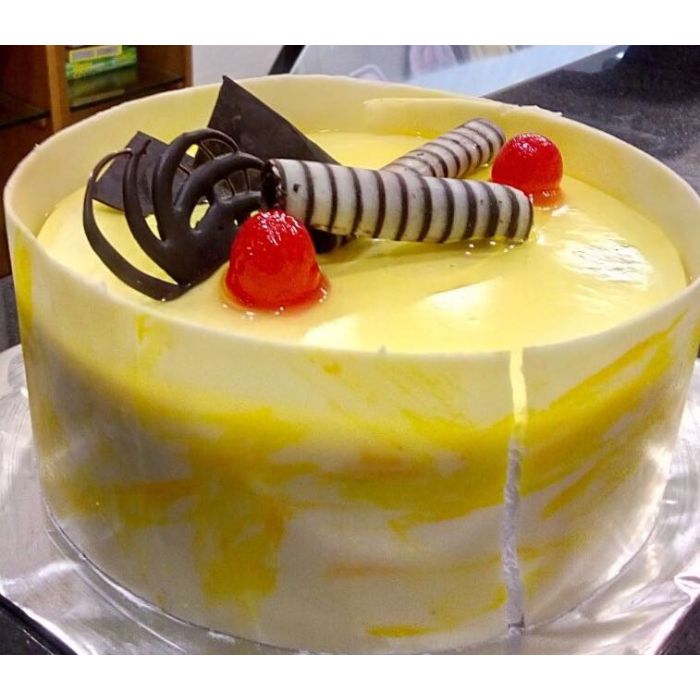Half Kg Pineapple with Chocolate Covering Cake Pune Half Kg Pineapple with Chocolate Covering Cake Pune