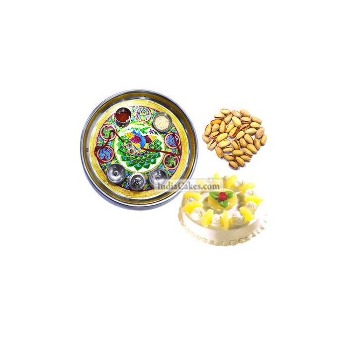 Golden Thali With Green Design And Half Kg Eggless Pineapple Cake And 250 gms Pista Dryfruits Golden Thali With Green Design And Half Kg Eggless Pineapple Cake And 250 gms Pista Dryfruits