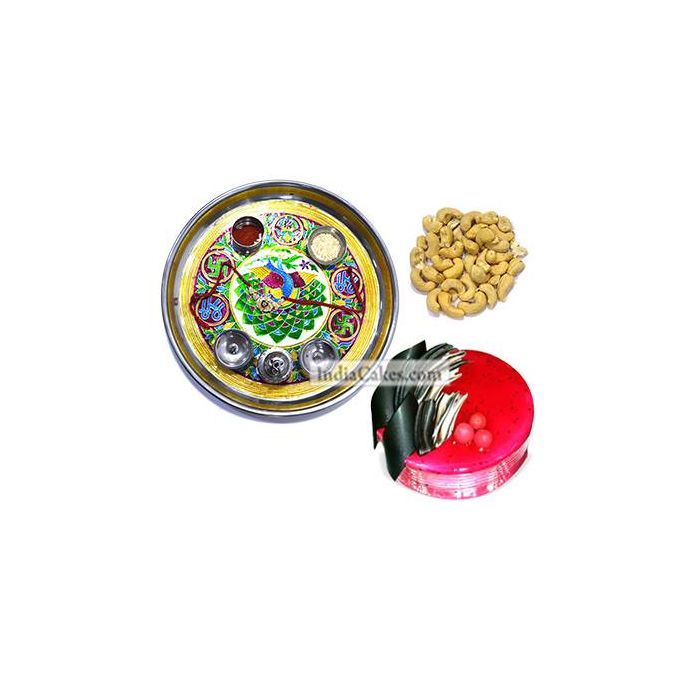 Golden Thali With Green Design And Half Kg Eggless Strawberry Cake And 250 gms Cashew Dryfruits Golden Thali With Green Design And Half Kg Eggless Strawberry Cake And 250 gms Cashew Dryfruits