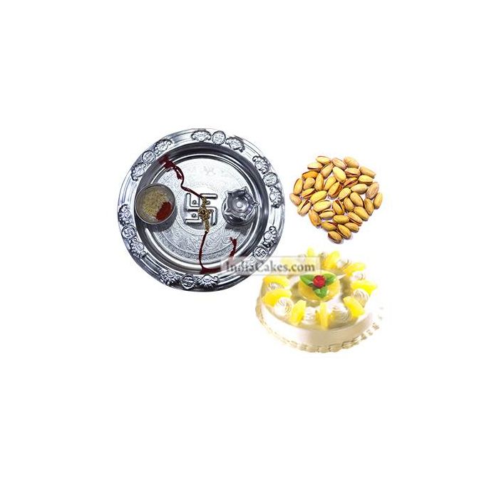 Silver Thali And Half Kg Eggless Pineapple Cake And 250 gms Pista Dryfruits Silver Thali And Half Kg Eggless Pineapple Cake And 250 gms Pista Dryfruits