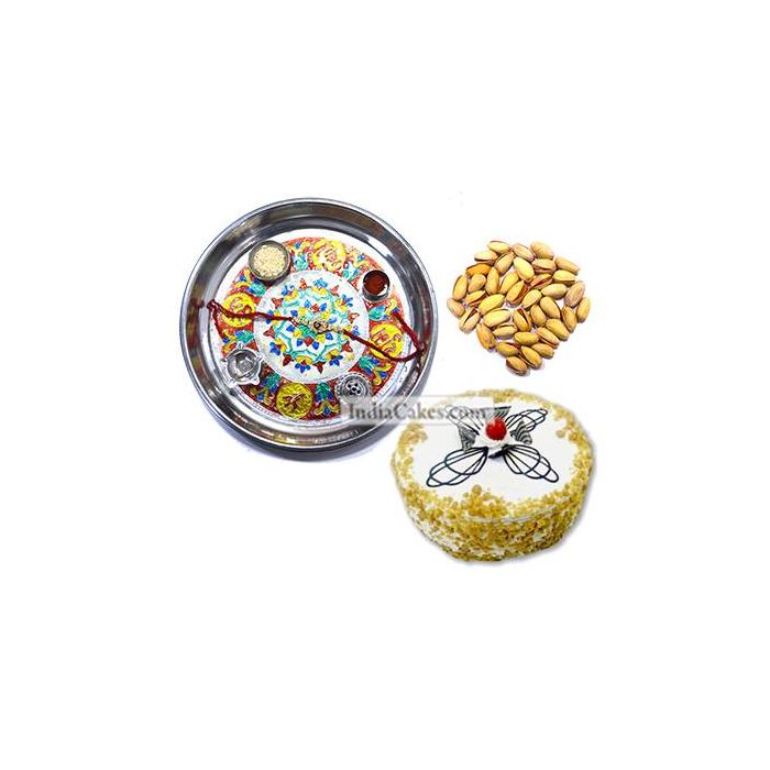 Silver Thali With Design And Half Kg Eggless Butterscotch Cake And 250 gms Pista Dryfruits Silver Thali With Design And Half Kg Eggless Butterscotch Cake And 250 gms Pista Dryfruits