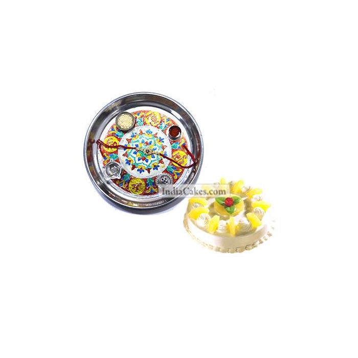Silver Thali With Design And Half Kg Eggless Pineapple Cake Silver Thali With Design And Half Kg Eggless Pineapple Cake