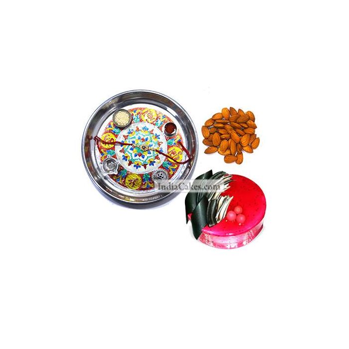 Silver Thali With Design And Half Kg Eggless Strawberry Cake And 250 gms Almond Dryfruits Silver Thali With Design And Half Kg Eggless Strawberry Cake And 250 gms Almond Dryfruits