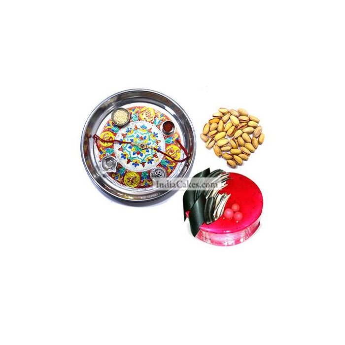 Silver Thali With Design And Half Kg Eggless Strawberry Cake And 250 gms Pista Dryfruits Silver Thali With Design And Half Kg Eggless Strawberry Cake And 250 gms Pista Dryfruits