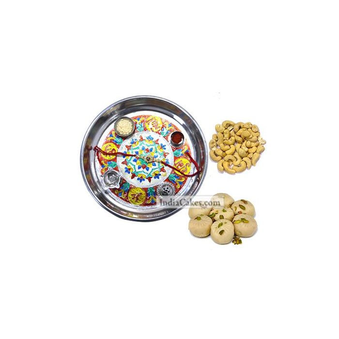 Silver Thali With Design And Pedha With Cashew Dryfruits