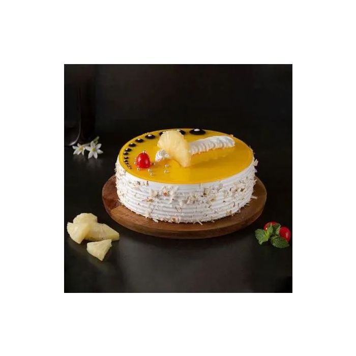 Eggless Succulent Pineapple Cake Half Kg Eggless Succulent Pineapple Cake Half Kg