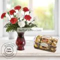 10 Red And White Carnations With 16 Ferrero Rocher Chocolates thumbnail