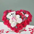 15 Red Roses with a Plush Teddy in Basket thumbnail