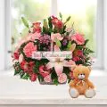 4 Lilies and 15 Carnations Arranged in Basket With a Cute Teddy thumbnail