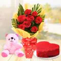 Eggless Half Kg Heart Shaped Red Velvet Cake with 6 Red Roses Bouquet and 6 Inch Teddy Bear thumbnail