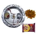 Silver Thali With Design And Soanpapdi And Raisins thumbnail