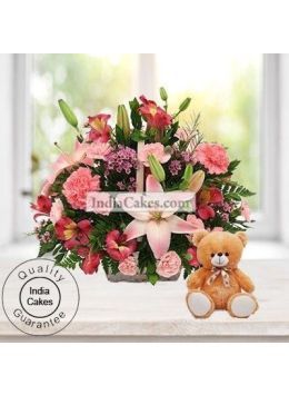 4 Lilies and 15 Carnations Arranged in Basket With a Cute Teddy 4 Lilies and 15 Carnations Arranged in Basket With a Cute Teddy