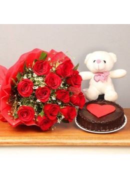 Eggless Chocolate Truffle Cake Half Kg with 6 Red Roses Bunch and a Teddy Bear Eggless Chocolate Truffle Cake Half Kg with 6 Red Roses Bunch and a Teddy Bear