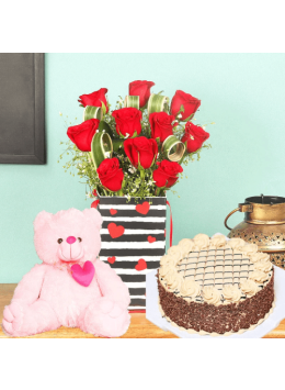 Half Kg Delightful Chocolate Cake with 6 Red Roses and 6 Inch Teddy Bear Half Kg Delightful Chocolate Cake with 6 Red Roses and 6 Inch Teddy Bear
