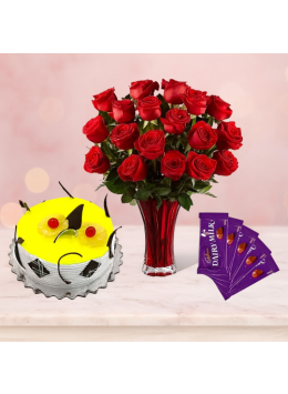 1 Kg Pineapple Cake-6 Red Roses Bunch-5Chocolates 1 Kg Pineapple Cake-6 Red Roses Bunch-5Chocolates